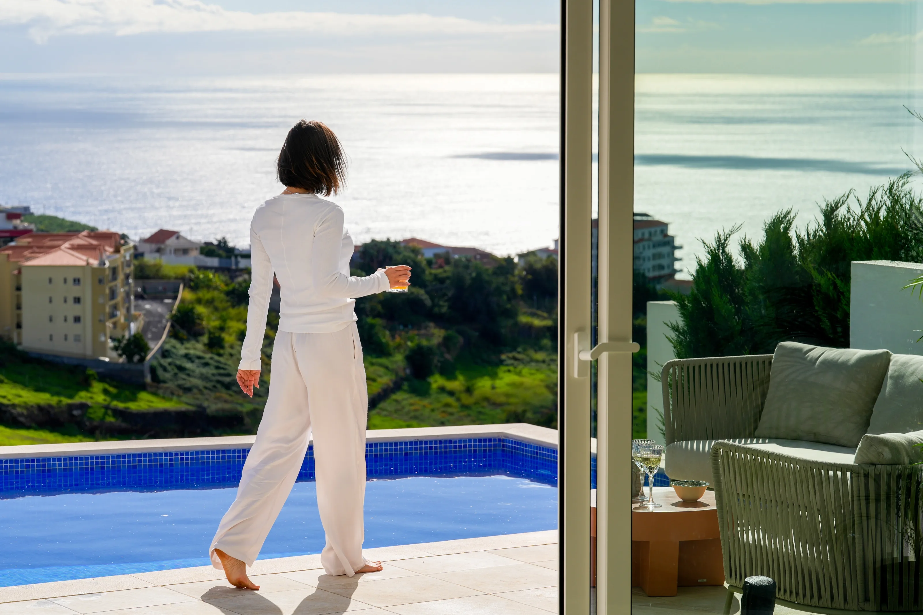 A quiet morning by the pool above the coast