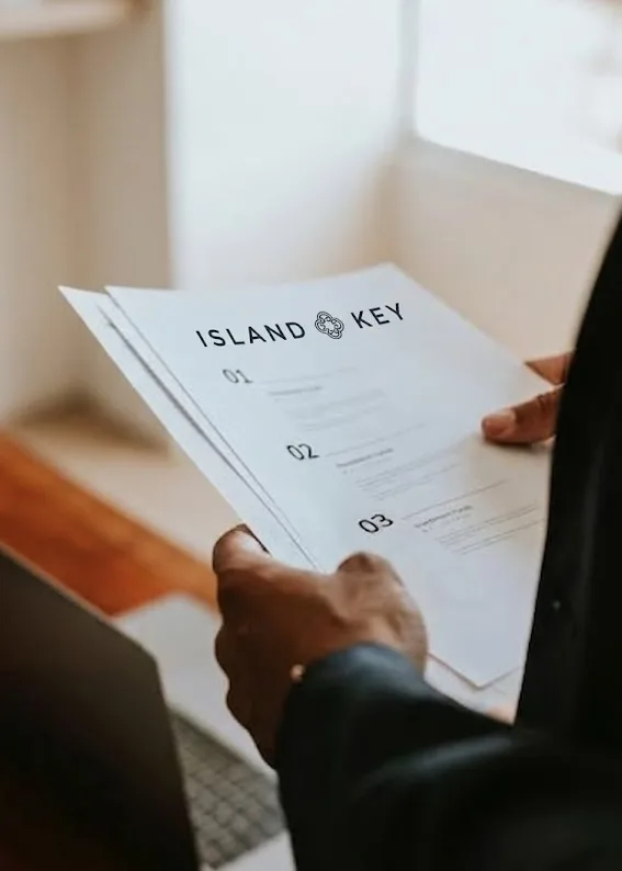 A summary of the bank offers held in hand by a window